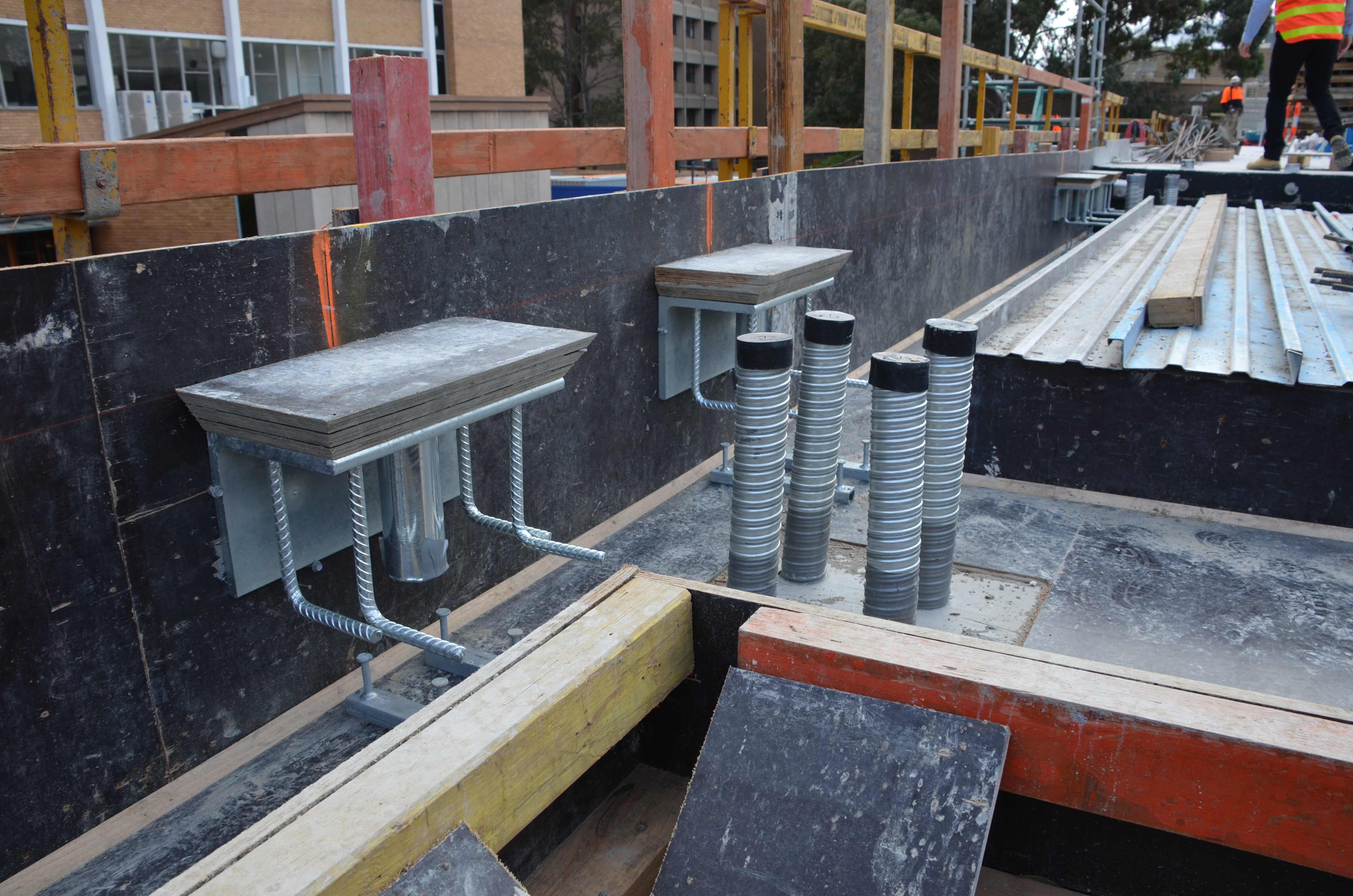 https://archive.abp.unimelb.edu.au/objects/images/Construction/Images/Concrete suspended slabs and beams/Cast in brackets/DSC_1946.JPG https://archive.abp.unimelb.edu.au/objects/images/Construction/Images/Concrete suspended slabs and beams/Cast in brackets/DSC_1946.JPG