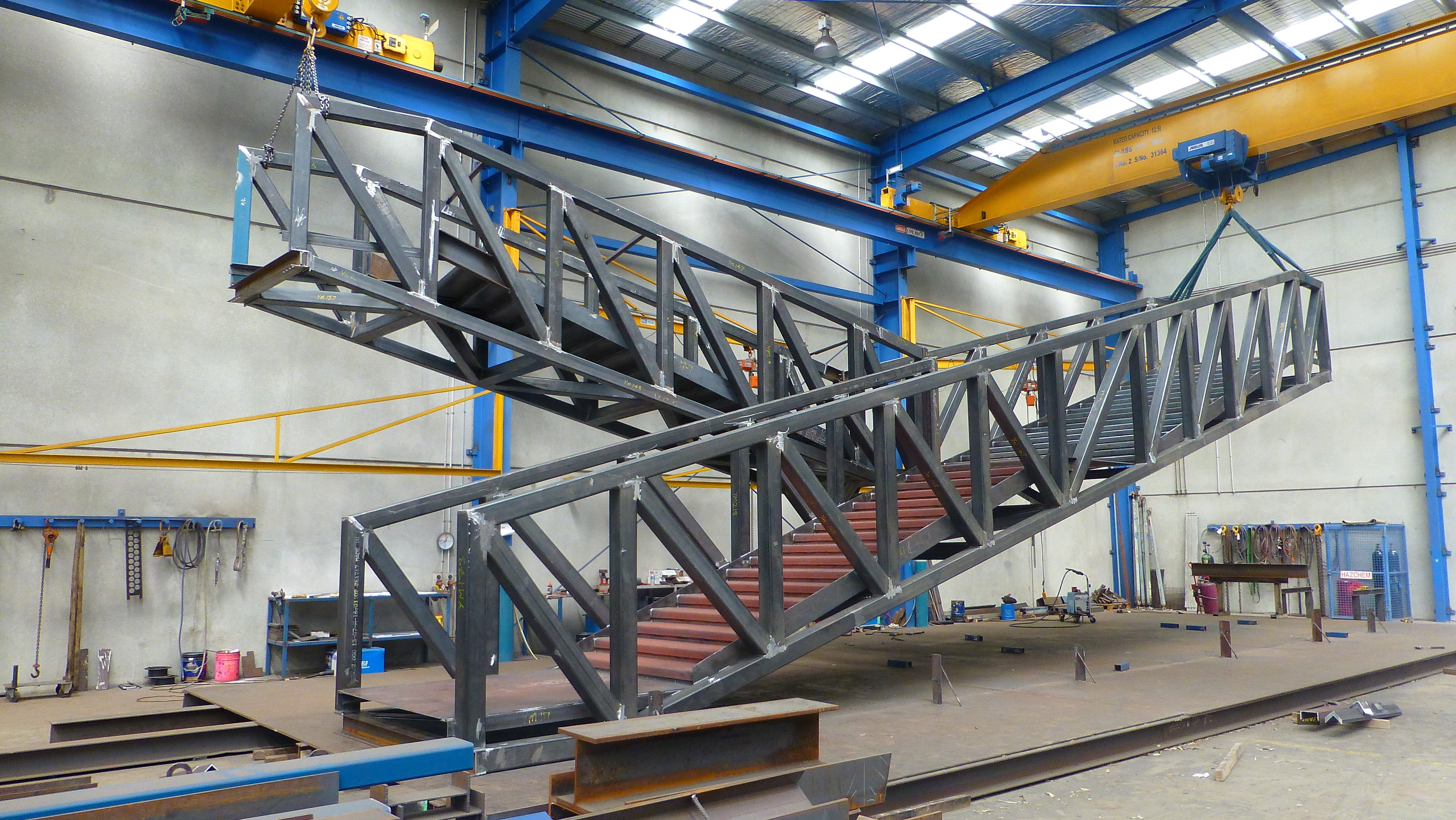 https://archive.abp.unimelb.edu.au/objects/images/Construction/Images/Stairs, walkways and balustrades/Y Stairs structural steel/Aus Iron Industries/Aus Iron 1.JPG