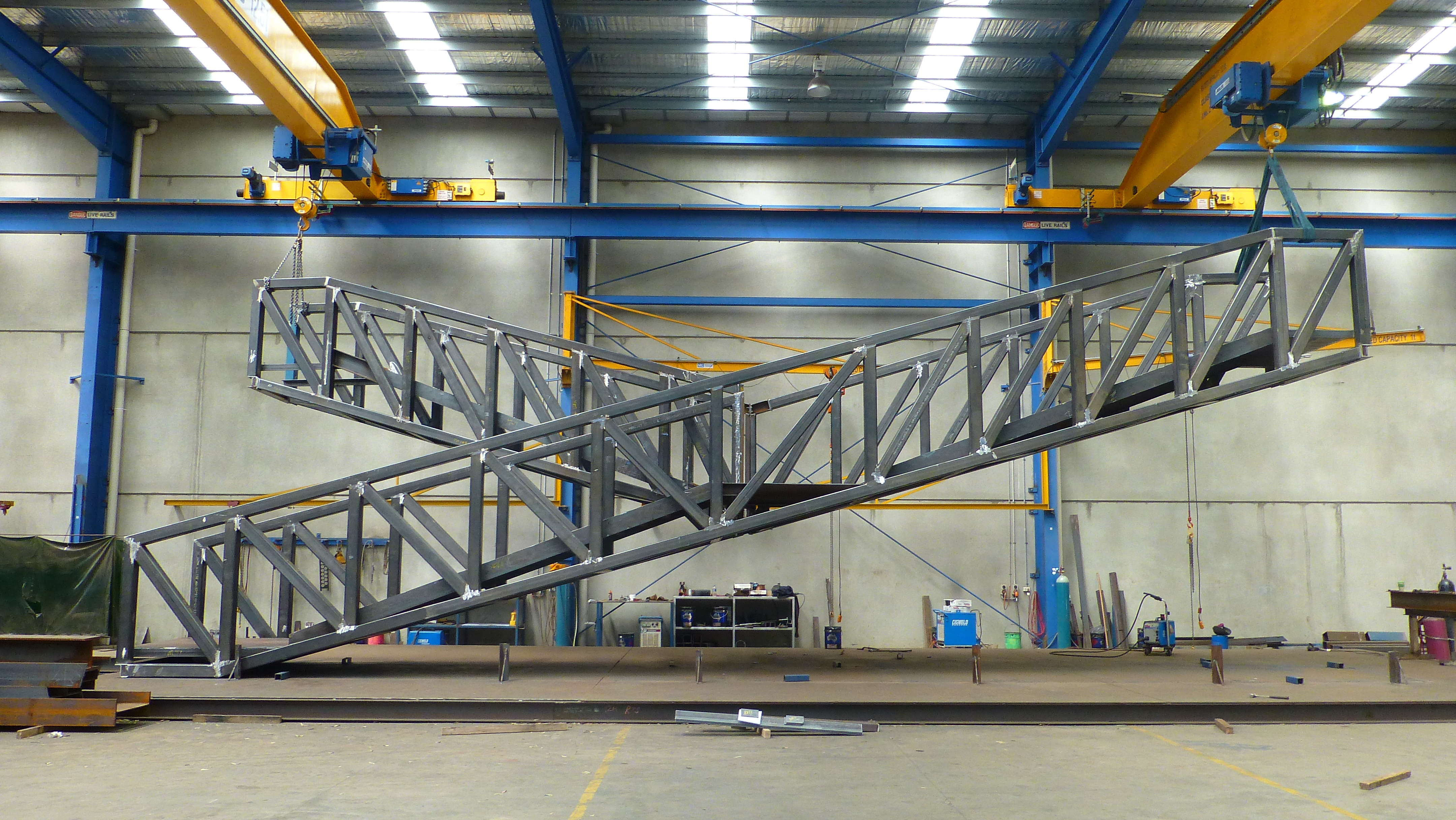 https://archive.abp.unimelb.edu.au/objects/images/Construction/Images/Stairs, walkways and balustrades/Y Stairs structural steel/Aus Iron Industries/Aus Iron 2.JPG