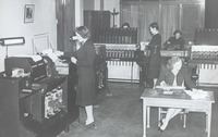 Red Cross workers calculating POW capture cards using a Hollerith Machine, one of six owned by the ICRC