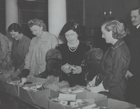 H.M. Queen Elizabeth, the Queen Mother (1900-2002) president of British Red Cross visits a Red Cross care package centre
