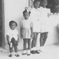 https://upload.wikimedia.org/wikipedia/commons/6/62/Trouillot_siblings_as_children.jpg