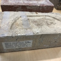 Machine-pressed brick