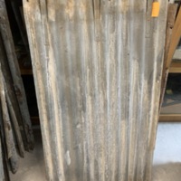 Corrugated iron tile